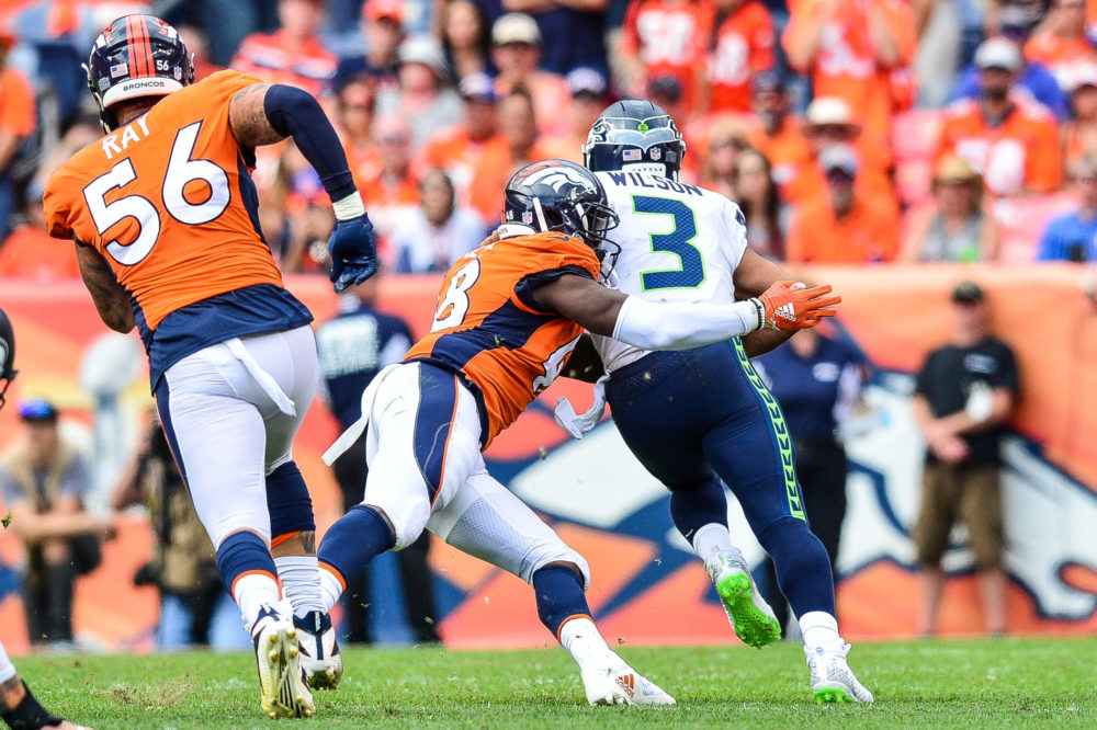 seattle seahawks quarterback russell wilson denver broncos